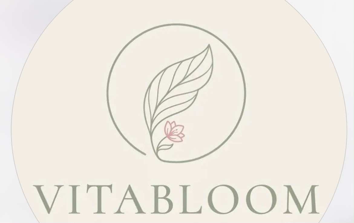 Logo Vitabloom: folha verde e flor rosa